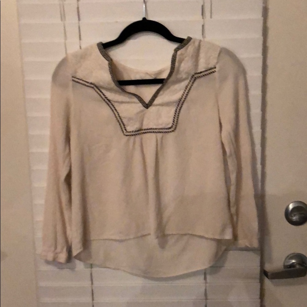 White bohemian long sleeve shirt.